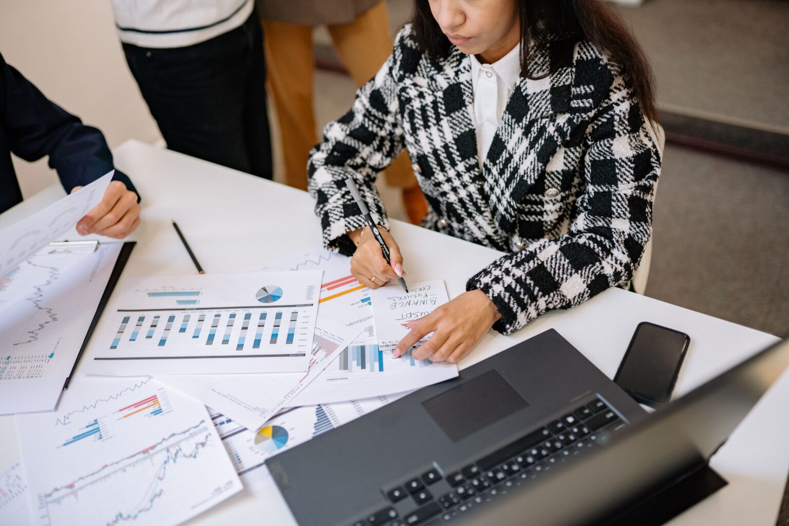 Professionals reviewing financial charts together